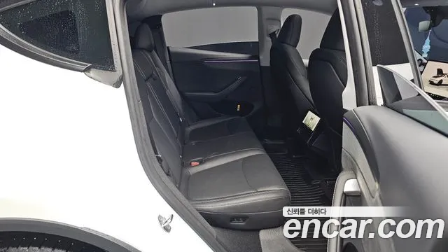 Tesla Model Y — Фото автомобиля 10