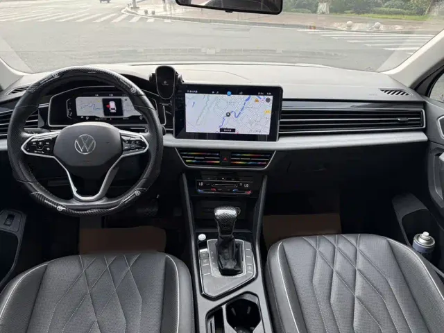 Volkswagen Tiguan L — Фото автомобиля 7