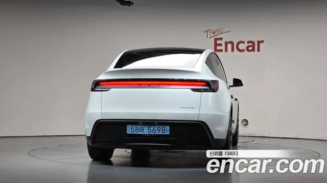 Tesla Model Y — Фото автомобиля 4
