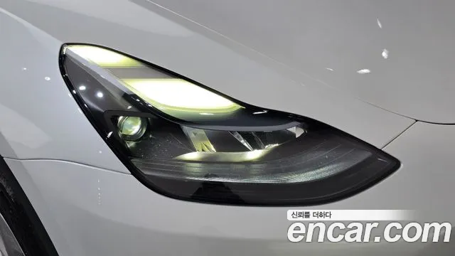 Tesla Model Y — Фото автомобиля 7