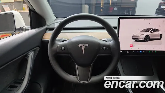 Tesla Model Y — Фото автомобиля 13