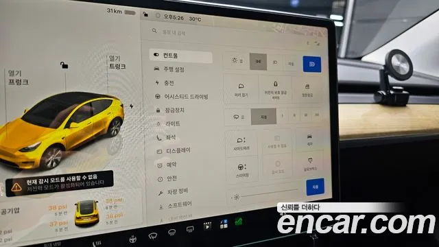 Tesla Model Y — Фото автомобиля 23