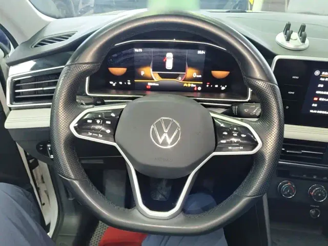 Volkswagen Tiguan L — Фото автомобиля 10
