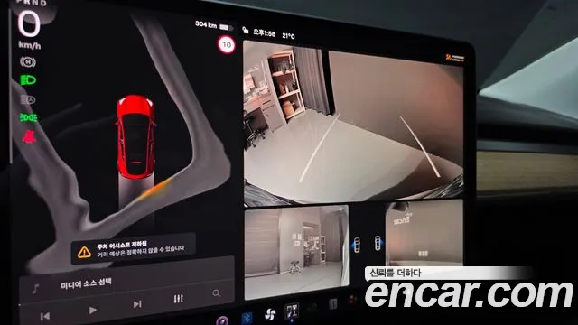 Tesla Model Y — Фото автомобиля 14