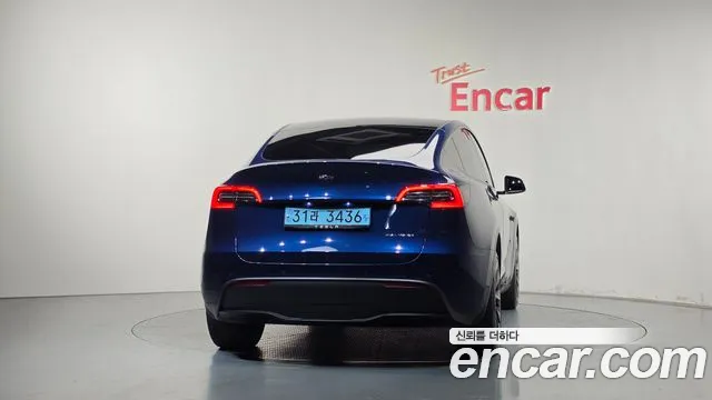 Tesla Model Y — Фото автомобиля 4