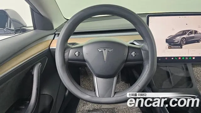 Tesla Model 3 — Фото автомобиля 15