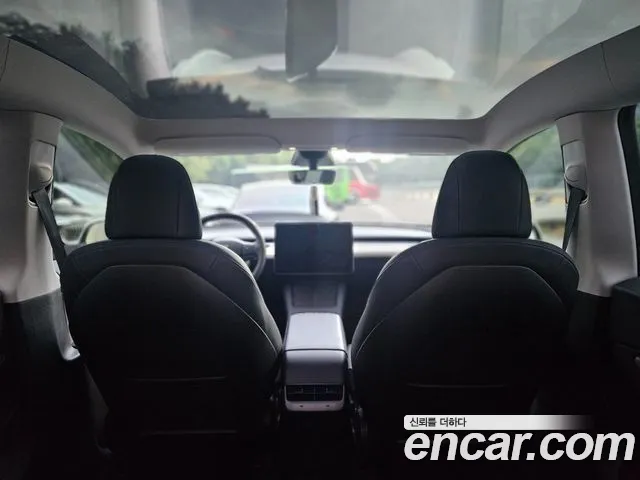 Tesla Model Y — Фото автомобиля 7