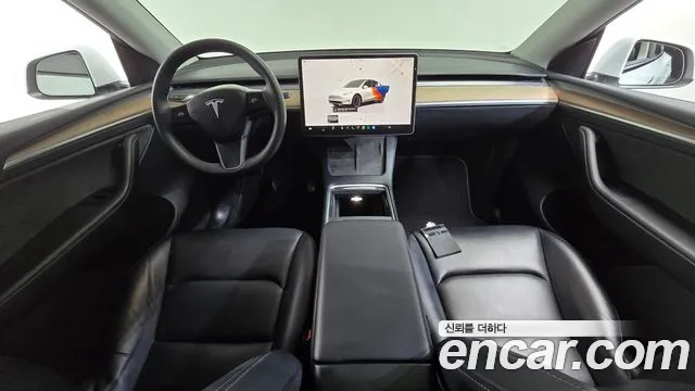 Tesla Model Y — Фото автомобиля 10