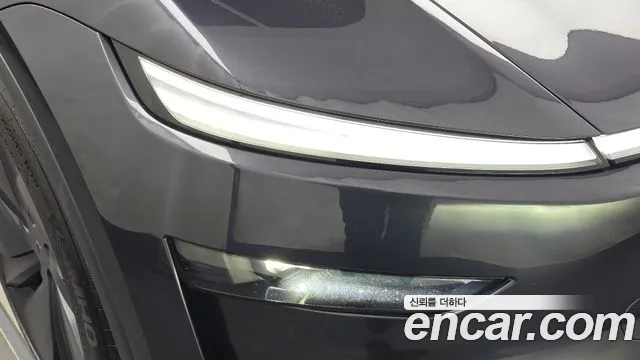 Tesla Model Y — Фото автомобиля 7