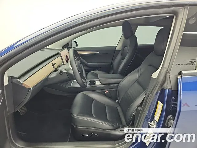 Tesla Model 3 — Фото автомобиля 11