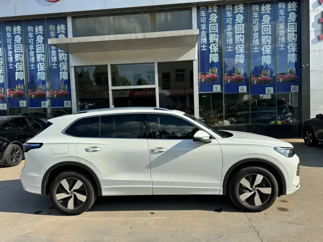 Volkswagen Tiguan L — Фото автомобиля 9