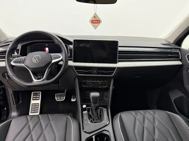Volkswagen Tiguan L — Фото автомобиля 9