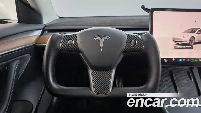 Tesla Model 3 — Фото автомобиля 11