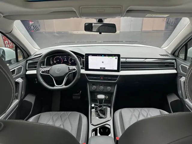 Volkswagen Tiguan L — Фото автомобиля 11