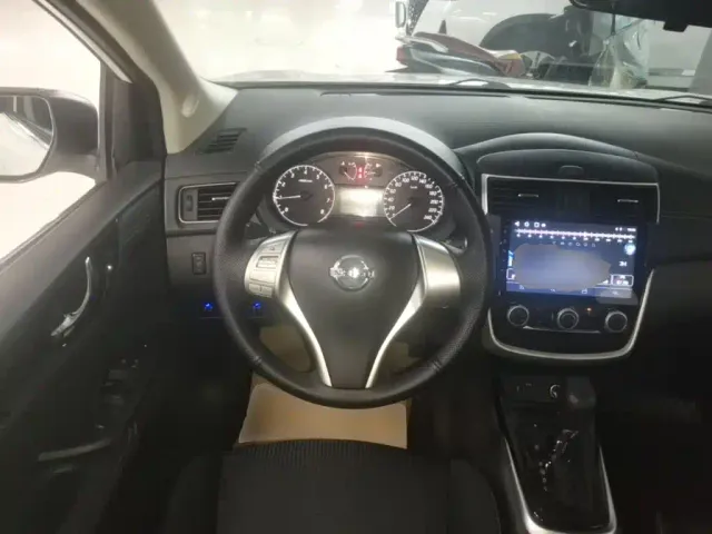 Nissan Tiida — Фото автомобиля 10