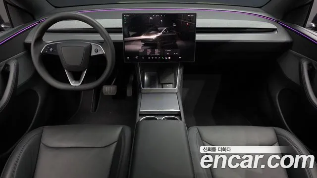 Tesla Model Y — Фото автомобиля 10