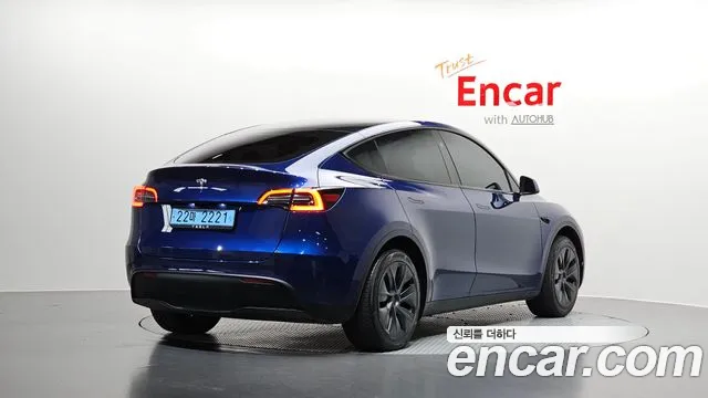 Tesla Model Y — Фото автомобиля 2