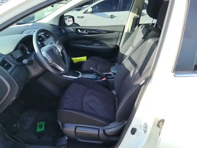 Nissan Tiida — Фото автомобиля 14
