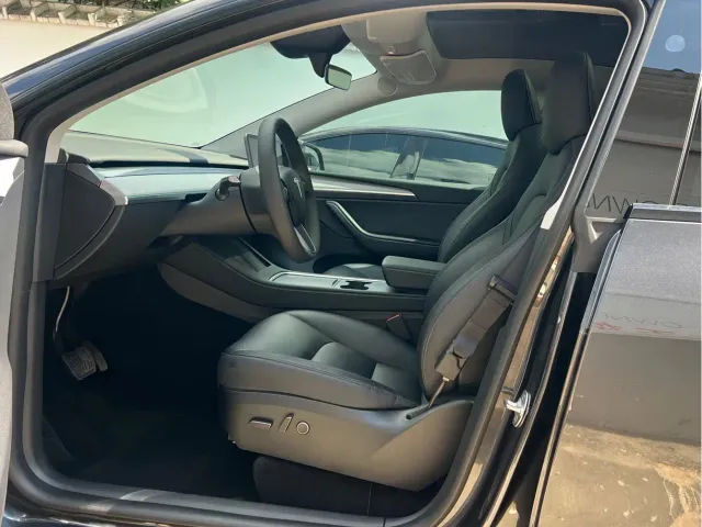 Tesla Model Y — Фото автомобиля 8