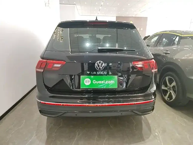 Volkswagen Tiguan L — Фото автомобиля 5