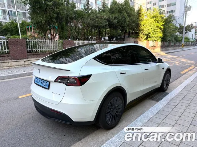 Tesla Model Y — Фото автомобиля 17