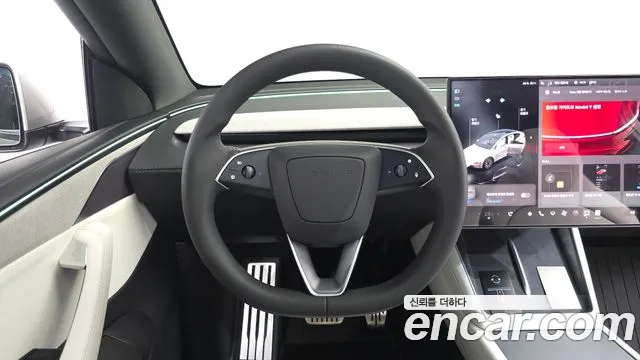 Tesla Model Y — Фото автомобиля 19