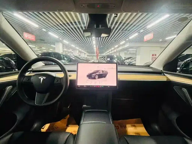 Tesla Model Y — Фото автомобиля 8