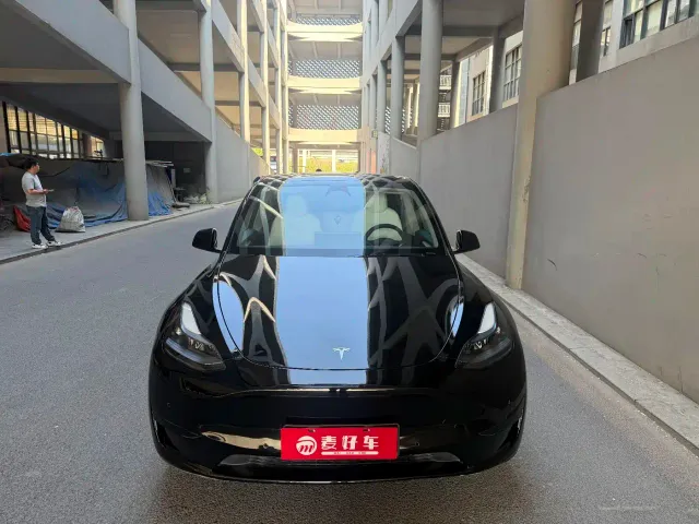 Tesla Model Y — Фото автомобиля 5