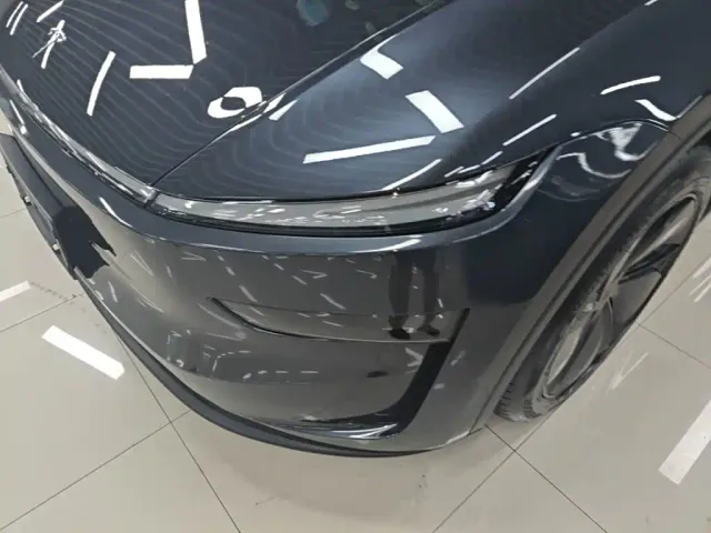 Tesla Model Y — Фото автомобиля 23