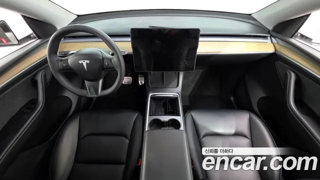 Tesla Model Y — Фото автомобиля 10
