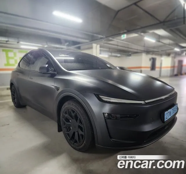 Tesla Model Y — Фото автомобиля 4