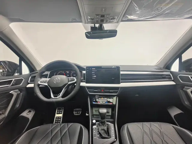 Volkswagen Tiguan L — Фото автомобиля 11