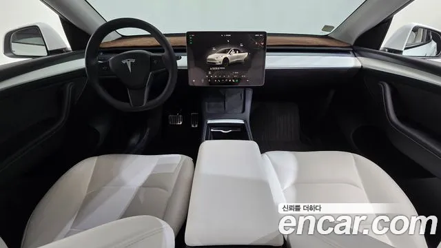 Tesla Model Y — Фото автомобиля 10