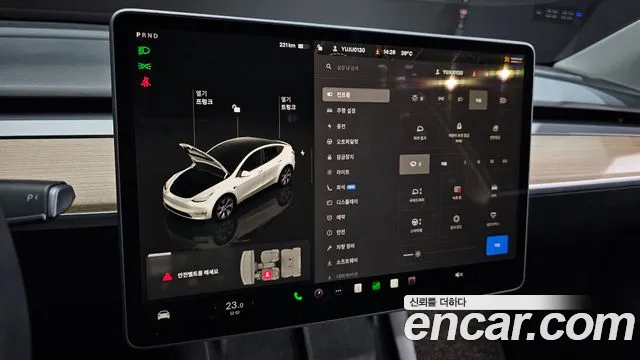 Tesla Model Y — Фото автомобиля 16