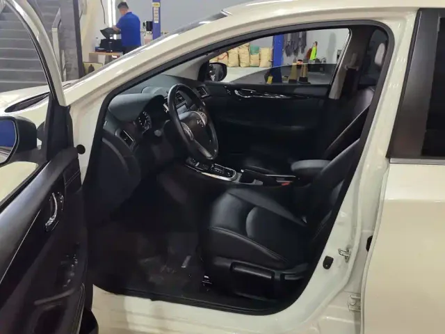 Nissan Tiida — Фото автомобиля 9
