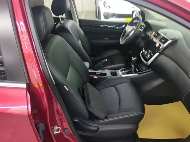 Nissan Tiida — Фото автомобиля 24