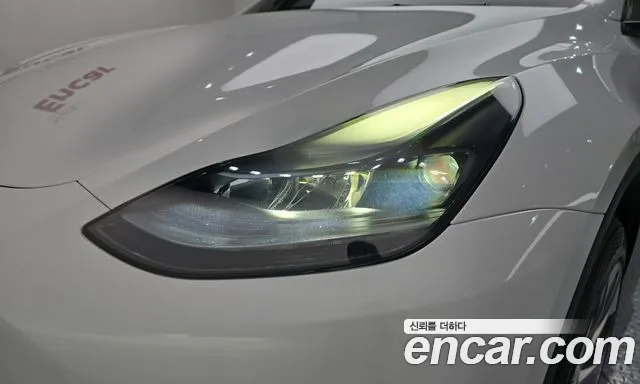 Tesla Model Y — Фото автомобиля 7