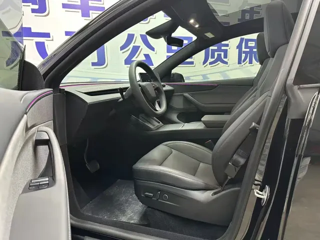 Tesla Model Y — Фото автомобиля 7