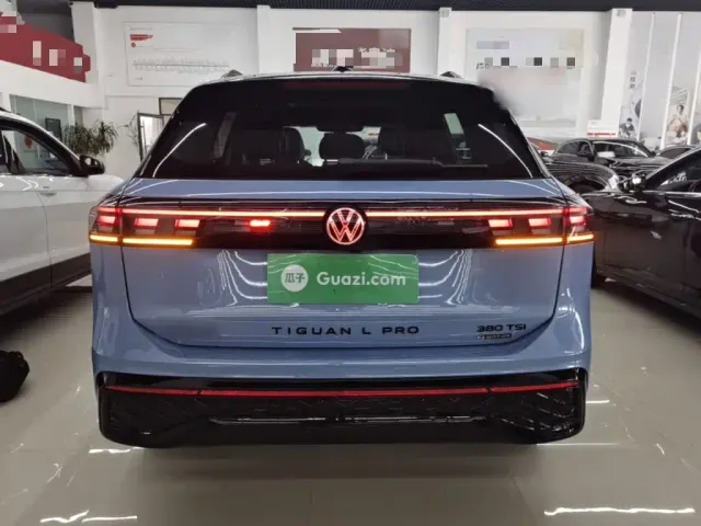 Volkswagen Tiguan L — Фото автомобиля 5