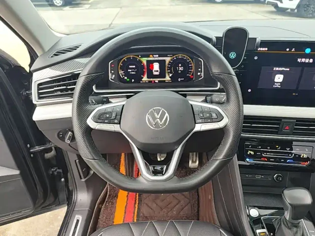 Volkswagen Tiguan L — Фото автомобиля 10