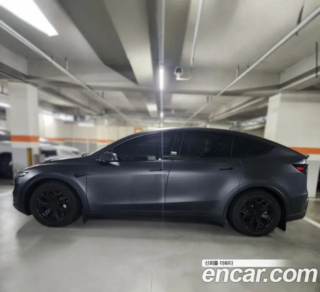 Tesla Model Y — Фото автомобиля 7