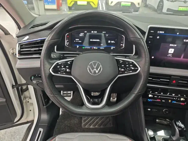Volkswagen Tiguan L — Фото автомобиля 10