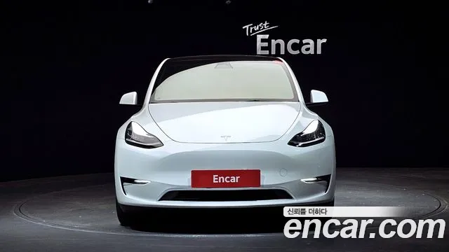 Tesla Model Y — Фото автомобиля 3