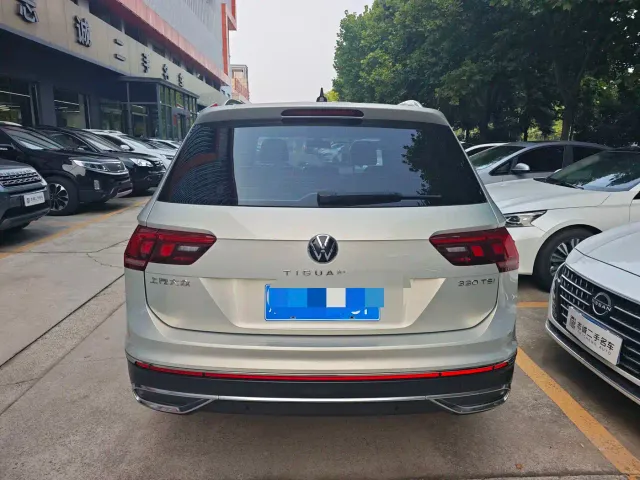 Volkswagen Tiguan L — Фото автомобиля 5