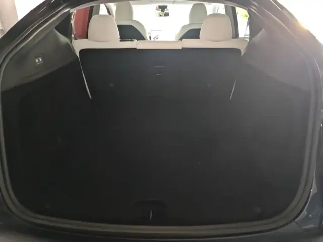Tesla Model Y — Фото автомобиля 18