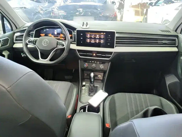 Volkswagen Tiguan L — Фото автомобиля 9