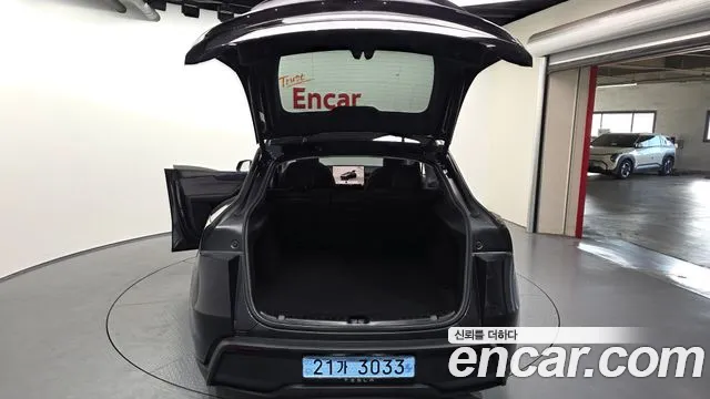 Tesla Model Y — Фото автомобиля 20