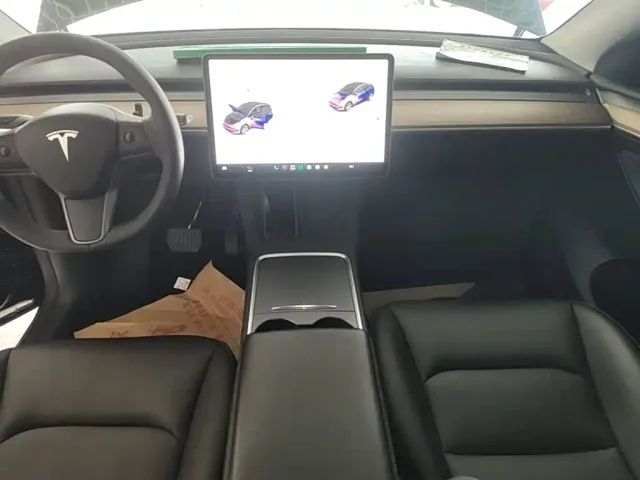 Tesla Model Y — Фото автомобиля 12