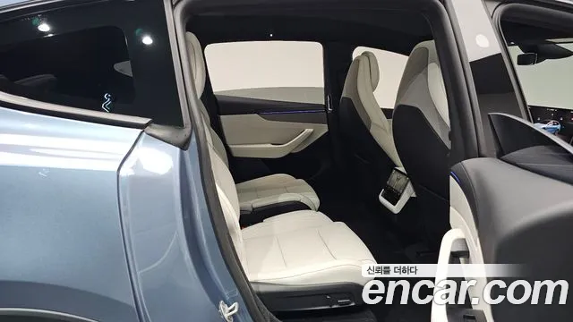 Tesla Model Y — Фото автомобиля 10