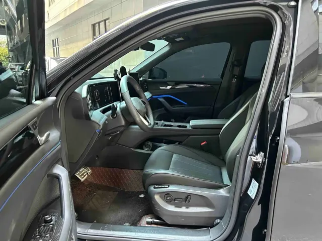 Volkswagen Tiguan L — Фото автомобиля 11